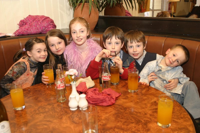 Enjoying a fizzy drink in The Gallery in 2004