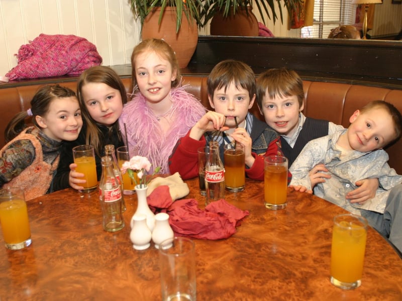 Enjoying a fizzy drink in The Gallery in 2004