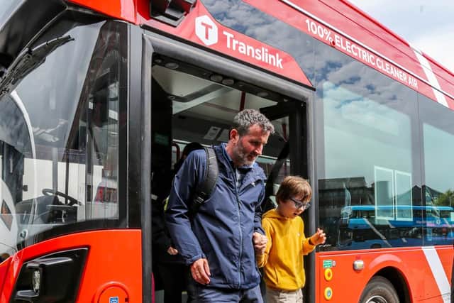L-R: Eamonn and Lui disembarking a Foyle Metro zero emissions bus at Foyle Street Bus Station.:Visually impaired young people enjoy public transport experience