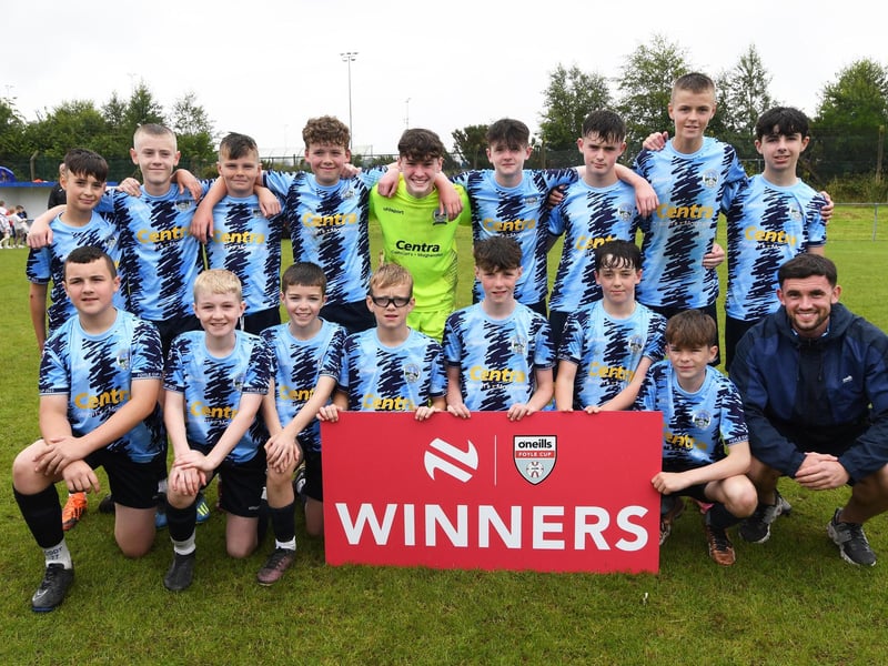 O'Neill's staff member Charlie White pictured with the Magherafelt Sky Blues team which lifted the O'Neills Foyle Cup Under-13 title at Wilton Park on Friday.