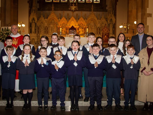 ROSEMOUNT  PS CONFIRMATION. . . . . .Pupils from Rosemount  Primary School, who received the Sacrament of Confirmation from Fr. Paul Farren at St. Eugene's Cathedral on Friday last. Included are  Mrs Aoife Meenan, Acting Principal , Mr Quinn class teacher, Mrs Geraldine McCafferty, assistant and Miss Mc Gowan. (Photo: Jim McCafferty Photography)