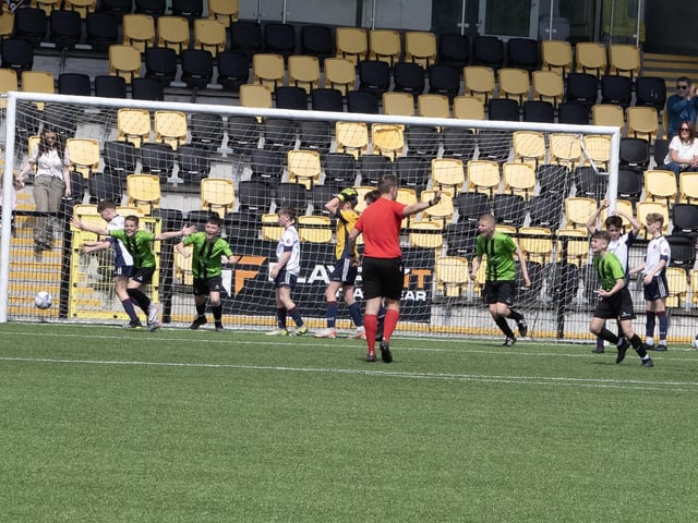 A delighted Shea Quigley turns away to celebrate his goal during Thursday's final.