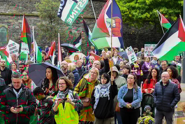 Crowds gather in Guildhall Square, on Thursday afternoon, to hear Palestinian photojournalist Motaz Azaiza.  Photo: George Sweeney