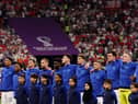 AL KHOR, QATAR - NOVEMBER 25: England stands for their national anthem before the match against the United States during the FIFA World Cup Qatar 2022 Group B match between England and USA at Al Bayt Stadium on November 25, 2022 in Al Khor, Qatar. (Photo by Elsa/Getty Images)