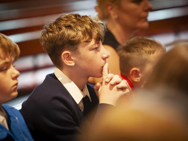 A St. Patrick’s PS pupil listens attentively to Bishop McKeown during last week’s Mass.