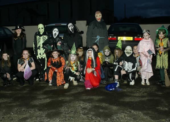 Young people boogying at a Halloween Disco in 2003
