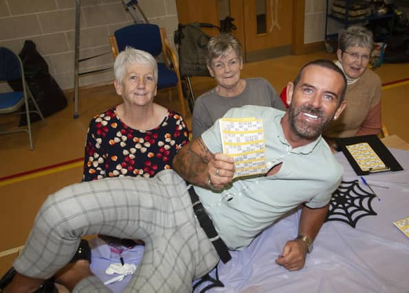 Numbers Caller Mickey Doherty with Marie Doherty, Maureen Sheerin and Margaret Taylor before Wednesday’s OLT/CNP Community Bingo in Creggan. (Photos: Jim McCafferty Photography)