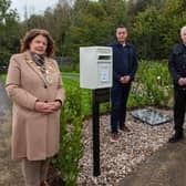 The Mayor, Councillor Patricia Logue officially unveiling the Letters To Heaven, letterbox  at the City and Ballyoan Cemeteries and other locations across the Derry City and Strabane District Council area last October. The dedicated post boxes enable  people to send letters to their loved ones. The scheme was proposed by former Mayor Graham Warke  and a poem by Michael Feeney has been placed at the new Garden of Angels in the City Cemetery. The unveiling was attended by Martin Parke, Cemeteries Team Leader and staff member Matt Higgins. Picture Martin McKeown. 18.10.23