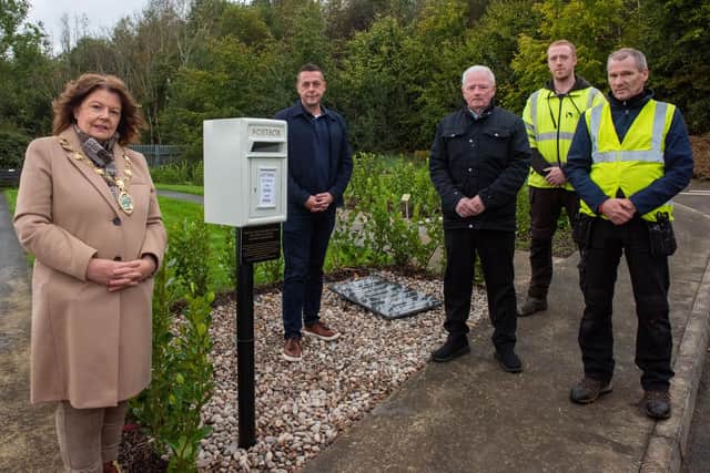 The Mayor, Councillor Patricia Logue officially unveiling the Letters To Heaven, letterbox  at the City and Ballyoan Cemeteries and other locations across the Derry City and Strabane District Council area last October. The dedicated post boxes enable  people to send letters to their loved ones. The scheme was proposed by former Mayor Graham Warke  and a poem by Michael Feeney has been placed at the new Garden of Angels in the City Cemetery. The unveiling was attended by Martin Parke, Cemeteries Team Leader and staff member Matt Higgins. Picture Martin McKeown. 18.10.23