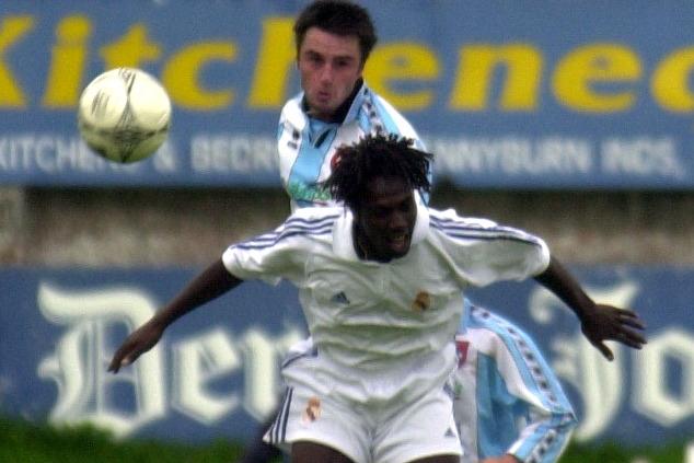 Darren Kelly challenges in the air.