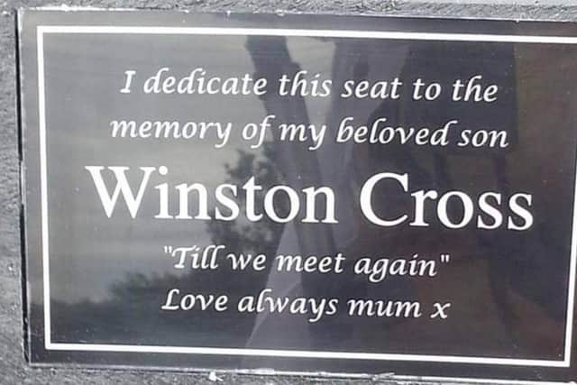 Winston's plaque on the seat.