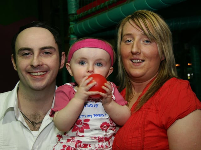 Jodie pictured with her mum Fiona and dad James on the occasion of her 1st birthday 0023JML : Parties and celebrations April 2006: Jodie Kennedy.