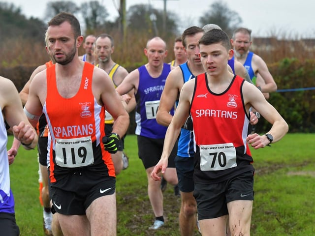 Spartans Aaron McCauley (119) and Aidan Healy (70) competing in the Spartans open cross country 6k race at Thornhill College on Saturday. Photo: George Sweeney