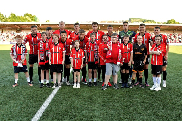 Mascots pictured with Derry City’s starting eleven against Shelbourne in the Ryan McBride Brandywell Stadium. Photo: George Sweeney. DER2321GS - 77