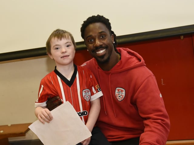 Young Football Fan Daniel with Kevin dos Santos.