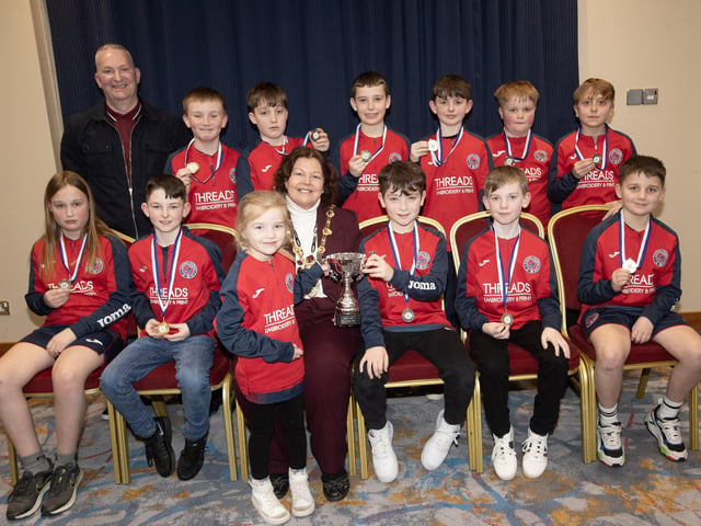 The Mayor of Derry City and Strabane District Council, Patricia Logue. pictured at the D&D Youth FA Annual Awards at the City Hotel on Friday night presents Clooney FC u-10s with the Summer Cup. Included is coach Richard Watson.