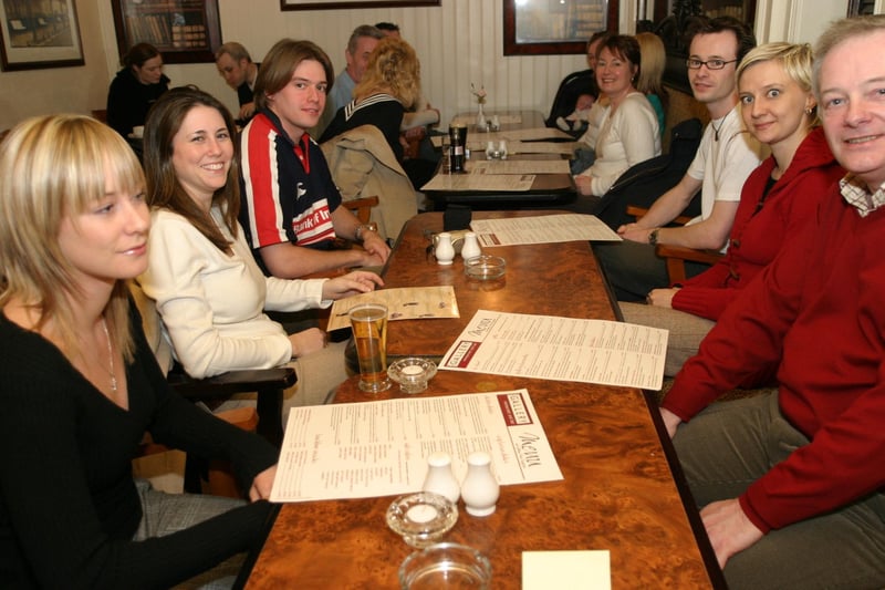 Enjoying a bite and a drink in The Gallery in 2004