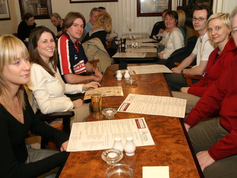 Enjoying a bite and a drink in The Gallery in 2004