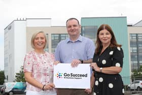 SDLP Foyle MLA Sinead McLaughlin with representatives from Aeroblue in Derry.