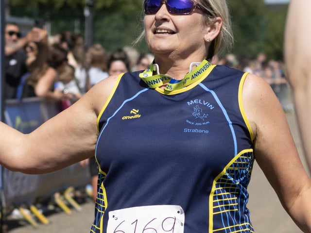 Flash Me if You Can relay team member crossed the finish line.