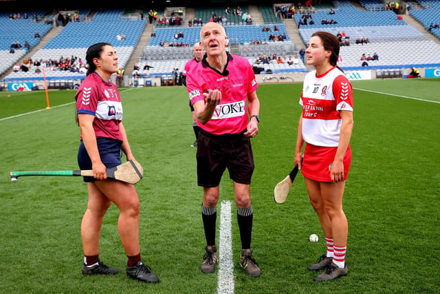 Westmeath’s Julie McLoughlin and Aine Barton of Derry with referee Cathal McAllister at the coin toss of Sunday's league final. (Photo: INPHO/Ryan Byrne)