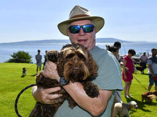 Barney with Brendan Nellis at the Moville Summer Festival Pet Show, held on The Green. Photo: George Sweeney