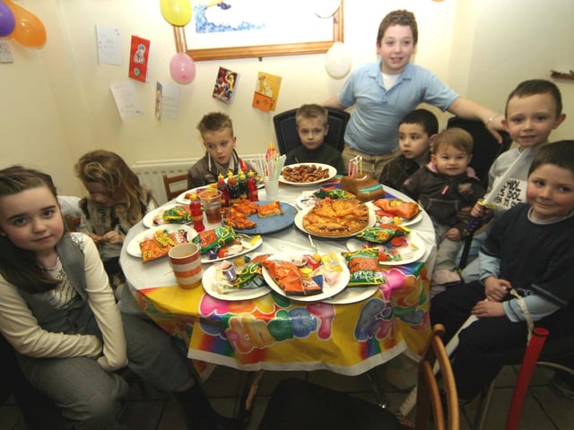 Caitlin, Zara, Jordon, Ciaran, Sean, birthday boy Declan, Leah, Jason and Fergus get ready to enjoy the birthday treats 0005/JML : Parties and celebrations January 2006: Declan.