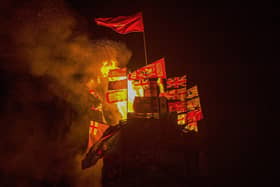 The bonfire at Meenan Square, in the Bogside, alights Friday night.  Photo: George Sweeney