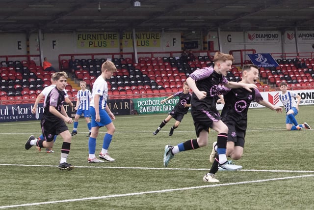 Loughgall players celebrate their opening score against Coleraine in the Foyle Cup u-12 final at Brandywell on Saturday. (Photos: Jim McCafferty Photography)