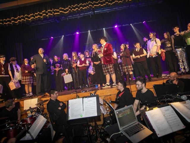 Mr. Gerry Beattie calls for another round of applause for the cast on Thursday night before curtain-down.
