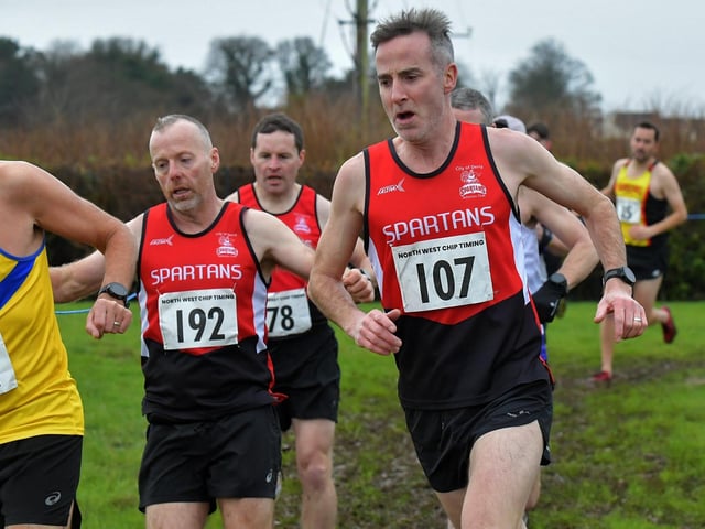 Spartans Diarmuid O’Kane (192) and Andrew Maguire (107) competing in the Spartans open cross country 6k race at Thornhill College on Saturday. Photo: George Sweeney