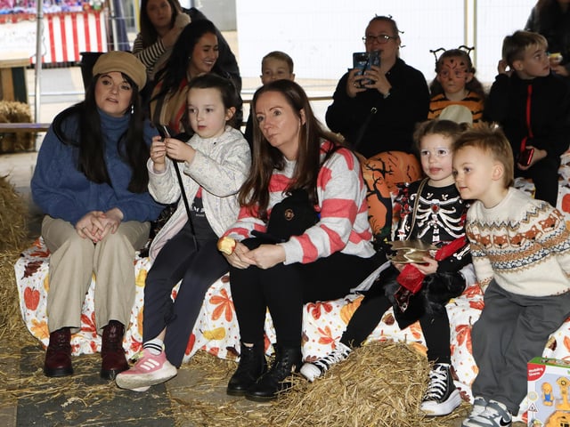 A family day out at the storytelling in Waterloo Place on the 40th anniversary of the Halloween celebrations. (Photo - Tom Heaney, nwpresspics)