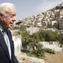 Former US president Jimmy Carter in the Arab east Jerusalem neighbourhood of Silwan. (Photo credit should read AHMAD GHARABLI/AFP via Getty Images)