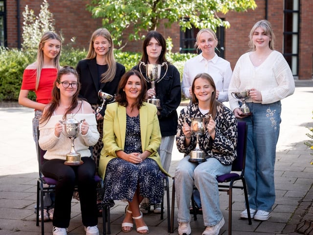 Top Performing Student in Each Subject. Front Row: Lily Brownrigg, Mrs Geraldine Walker (Head of Year), Tara Burns. Back Row: Eve Quigley, Eve McGinley, Caoimhe Wilson, Maisy Delaney, Cloe McCann.
