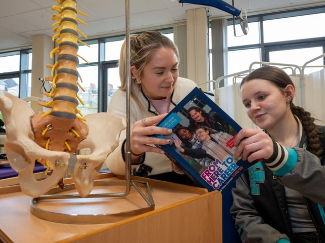 Elisha Holden from Oakgrove College finds out about Health and Care courses at NWRC from lecturer Gemma Devine. (Pic Martin McKeown).