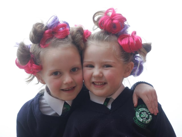 Sisters Jane (6) and Holly (4) McConnellogue went all out for the Bad Hair Day held in St. Patrick';s Primary School,to raise money for the tsunami disaster. (1801C13) : St Patrick's Primary School's Bad Hair Day from 2005.