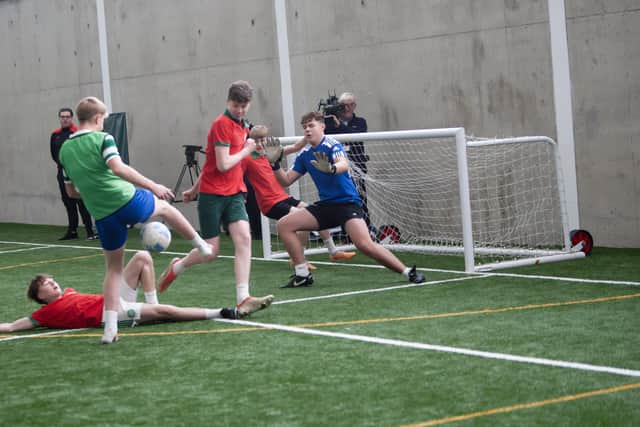 Goal opportunity thwarted with this slide tackle in the Buncrana v. Leitrim game on Friday.