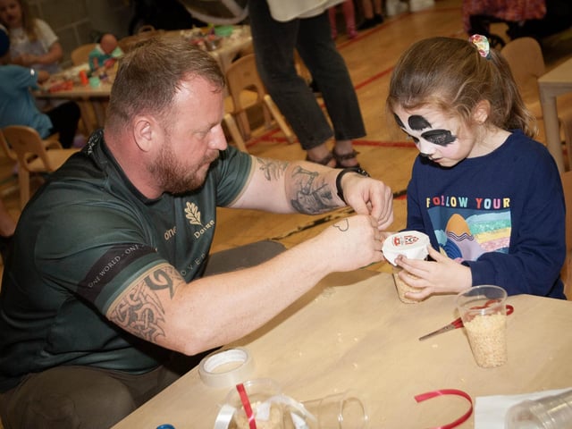 Even dads were getting in on the act making Derry City Crackers during Friday night's fun.