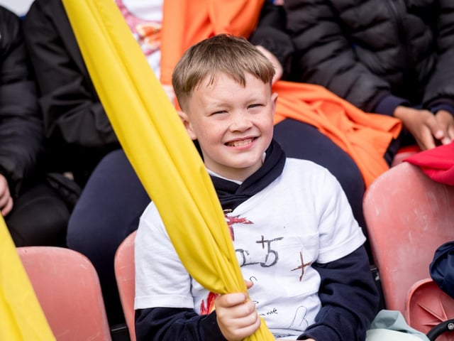 Participants at the Derry Diocese Fan The Flame annual Mass 2025 in Celtic Park.