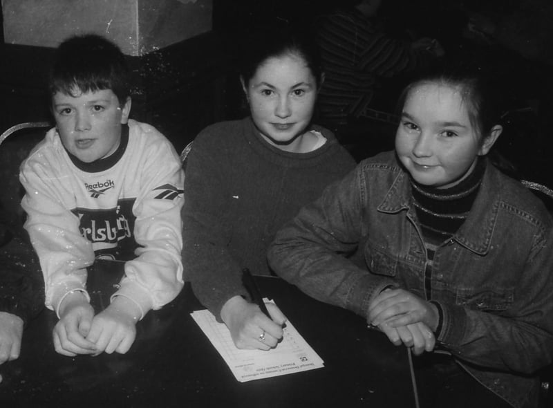 Pupils from St. Mura's, NS, Tooban, who took part in the Derry Journal National Schools Quiz. From left, Ronan Hutchinson, Leonie Durnan and Courtney Greene.