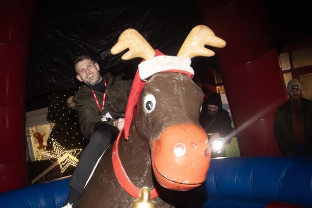 Mr. Lowry having fun in the Buckin Bronco on Thursday night.
