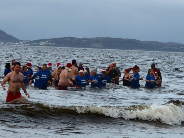 Christmas Day dippers at the annual swim at Ludden beach, Buncrana, County Donegal.