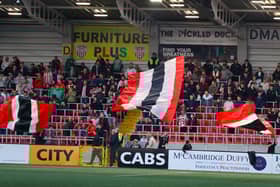 Derry City supporters pictured in the North Stand for its official opening on Friday night. Photograph by Kevin Moore.