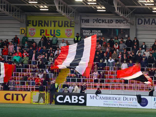 Derry City supporters pictured in the North Stand for its official opening on Friday night. Photograph by Kevin Moore.