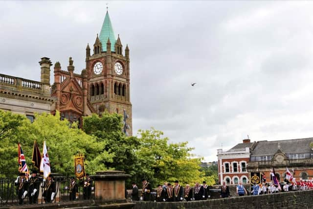 The Apprentice Boys marching on the Derry Walls.