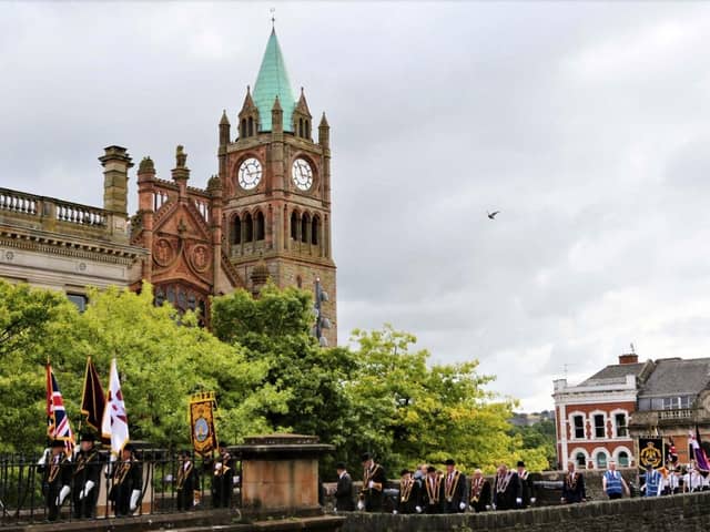The Apprentice Boys marching on the Derry Walls.