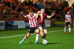 Ronan Boyce tussles for the ball against Galway at Brandywell at the end of March. Photograph by Kevin Moore.