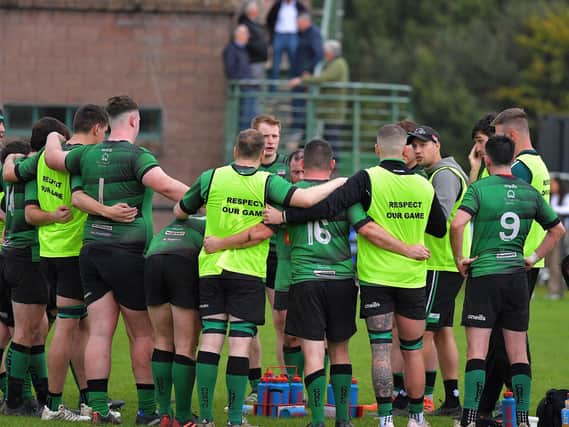 City of Derry head coach Richard McCarter speaks to his players during a recent game at Judges Road. Photo: George Sweeney