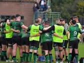 City of Derry head coach Richard McCarter speaks to his players during a recent game at Judges Road. Photo: George Sweeney