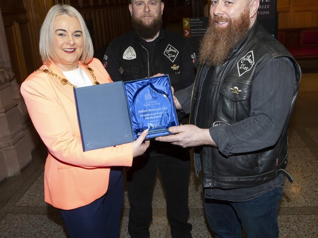 The Mayor, Sandra Duffy pictured with Kevin and Michael Kelly during Friday night’s presentation at the Guildhall in honour of The Outlaws Motorcycle Club.:.